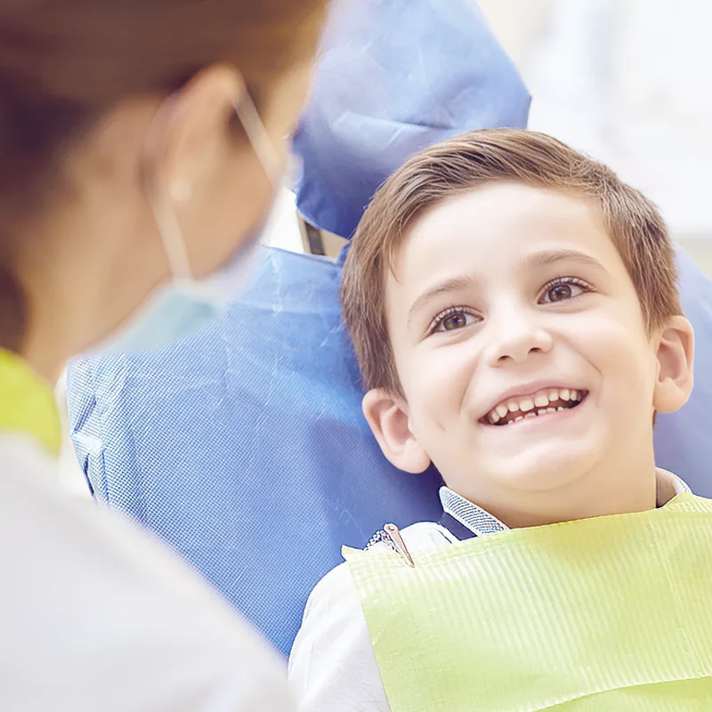 child with a dentist